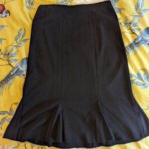 MISOOK knit knee length pleated fit and flare black skirt euc sz small